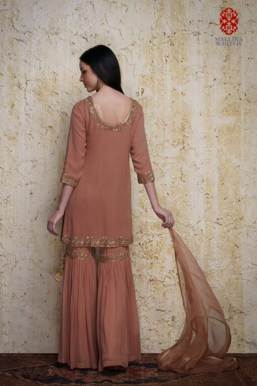 ‘Gulnaz’ old rose georgette kurta paired with a gharara hand embroidered